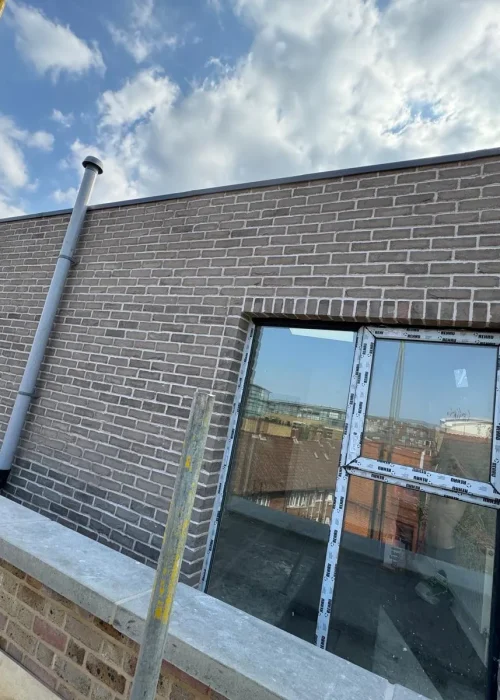 M&V Brickwork Ltd - New Build 2 Bedrom Flat Frame Work Bulid With Brick Slip (1)