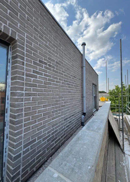 M&V Brickwork Ltd - New Build 2 Bedrom Flat Frame Work Bulid With Brick Slip (3)